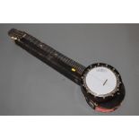 A rosewood and beech six string banjo by J E Dallas, 415 Strand Number 640 T,