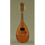 An early 20th century Stridente 8 string Neapolitan mandolin, 59 cm long,