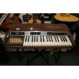 A vintage brown plastic cased Eko Tivoli 18R electric keyboard, 78 cm wide.