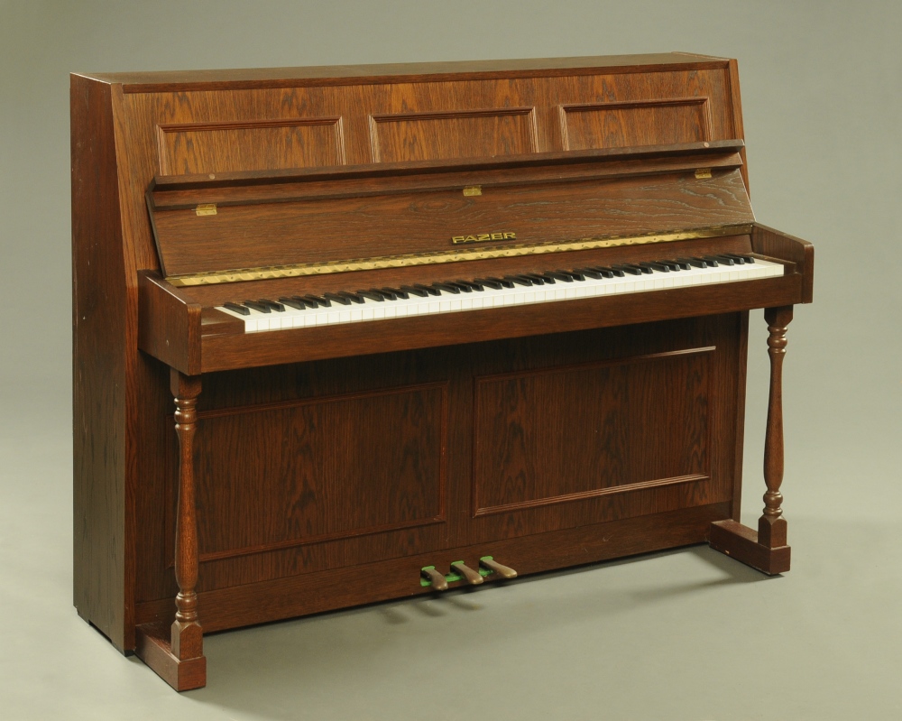 A modern Fazer oak finish upright piano, 141 cm wide.