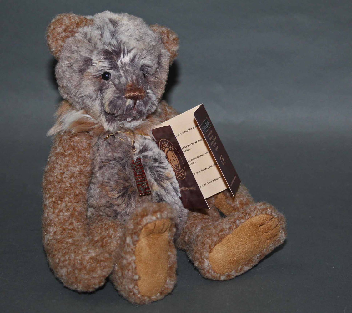 A soft plush "Benny" Charlie Bear, CB171779A, having brown and grey tinged fur body,
