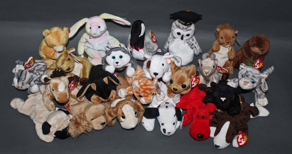 A group of 49 TY Beanie babies, animal soft toys, mostly all with swing tags, and tush tags.