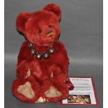 A soft plush "Rusty" Charlie Bear, CB0104582, having rusty fur covered body,