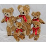 A family of five Merrythought teddy bears, of graduating sizes,