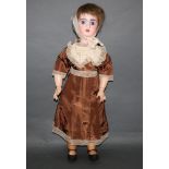 An early 19thC French bisque headed doll, marked "8" to the back of the repaired head,