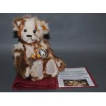 A soft and long plush "Tickle" Charlie Bear, CB630310D, having brown and cream coloured fur body,