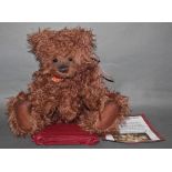 A soft plush "Kelvin" Charlie Bear, CB614849, having shaggy brown fur covered body,