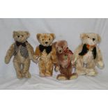 A group of four Dean's Rag Book Company teddy bears, including three limited edition versions,