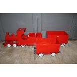 A scratch built wooden 4-2-2 "Stephenson" steam locomotive and two wagons,