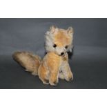 A 1950's style Berg plush covered fox,