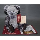 A soft plush "Humble" Charlie Bear, CB161692, having grey tipped fur covered body,