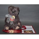 A soft plush "Boo" Charlie Bear, CB194079C, having grey fur covered body and shaved muzzle,