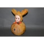 An early 20th Century rabbit doll,