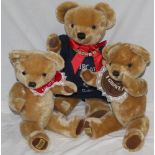 A group of three Merrythought teddy bears, all with blonde mohair covered bodies,