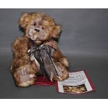 A soft plush "Arthur" Charlie Bear, CB120004B, having latte and cream fur covered body,