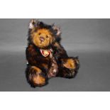 A soft plush "Bentley" Charlie Bear, CB0104632, having dark brown, terracotta,