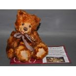 A soft plush "Scamp" Charlie Bear, CB104691, having fox-red fur covered body,