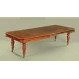 A Victorian mahogany extending dining table,