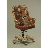 An interesting tree root and or driftwood swivel armchair.