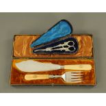 A pair of silver mounted fish servers, Sheffield 1893, together with a cased pair of grape scissors.