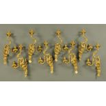 A set of eight Ormolu two branch wall light fittings,