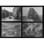 Early 20th century photographic glass half and full plates, depicting vintage cars on tour,