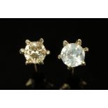 A pair of 9 ct gold diamond stud earrings.