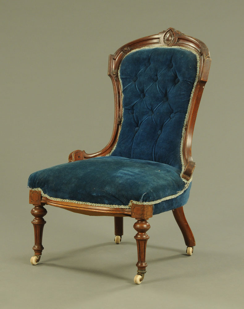 A Victorian walnut framed nursing chair,