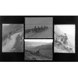 Thirty four early 20th century photographic plates depicting motorcycle trials,