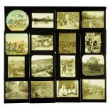 Sixteen late Victorian/early 20th century magic lantern slides, some coloured,