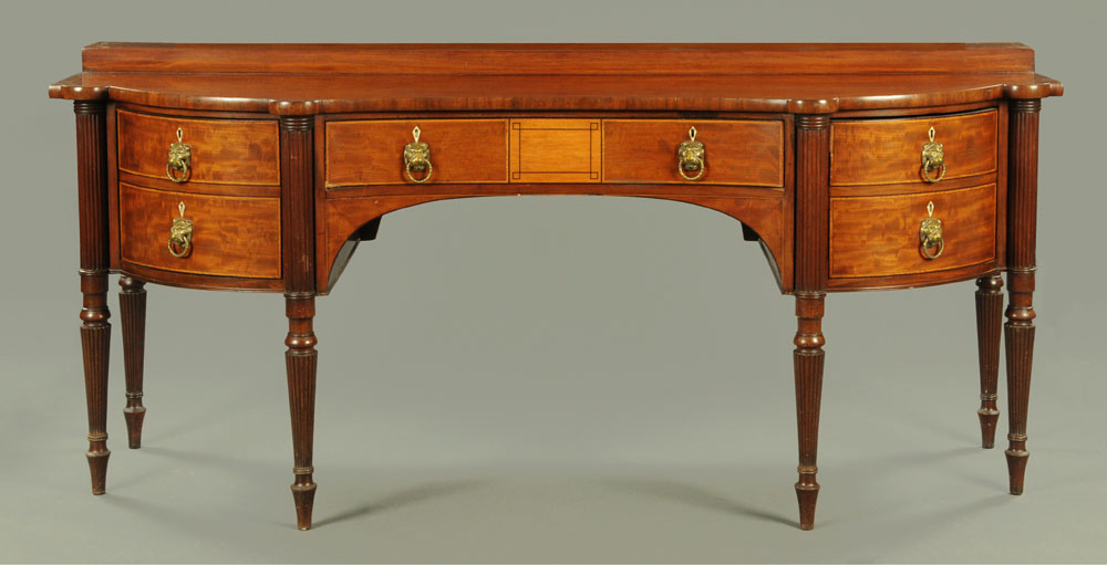 A Regency mahogany inverted bowfront sideboard, with boxwood and ebony stringing,