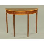 An Edwardian style mahogany satinwood banded demi lune hall table,