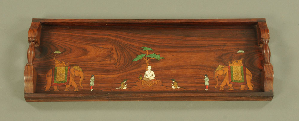 An Eastern rosewood rectangular tray, inlaid with bone and decorated with figures and elephants.