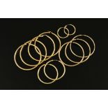 A collection of 9 ct gold hoop earrings, 17.4 grams.