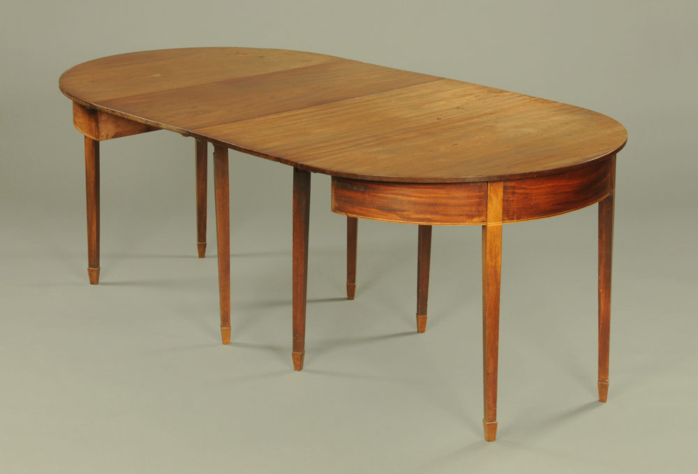 A 19th century mahogany dining table, comprising two D ends,