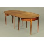 A 19th century mahogany dining table, comprising two D ends,