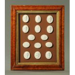 A set of fourteen 19th century plaster oval intaglios, depicting Roman Emperors and scenes,
