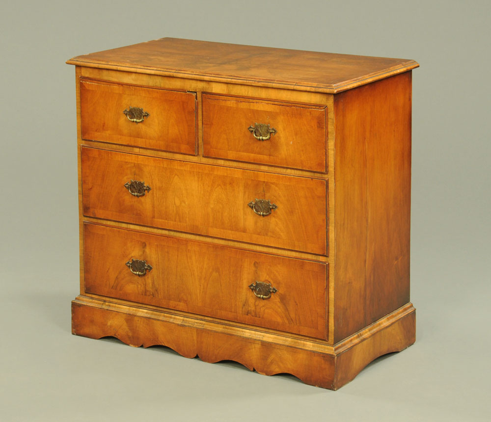 A Queen Anne style walnut chest of drawers, reproduction,