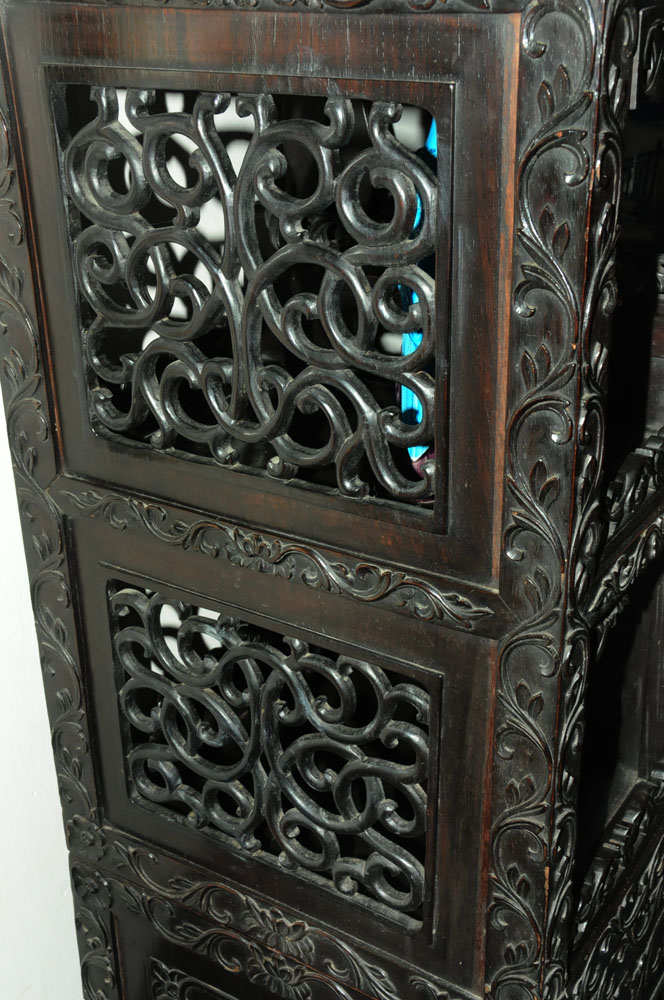 A 19th century Chinese hardwood cabinet in two sections, - Image 6 of 18