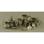 A collection of pewter measures, tankards, sifters, wine funnel, spoons etc. Tallest 18 cm.