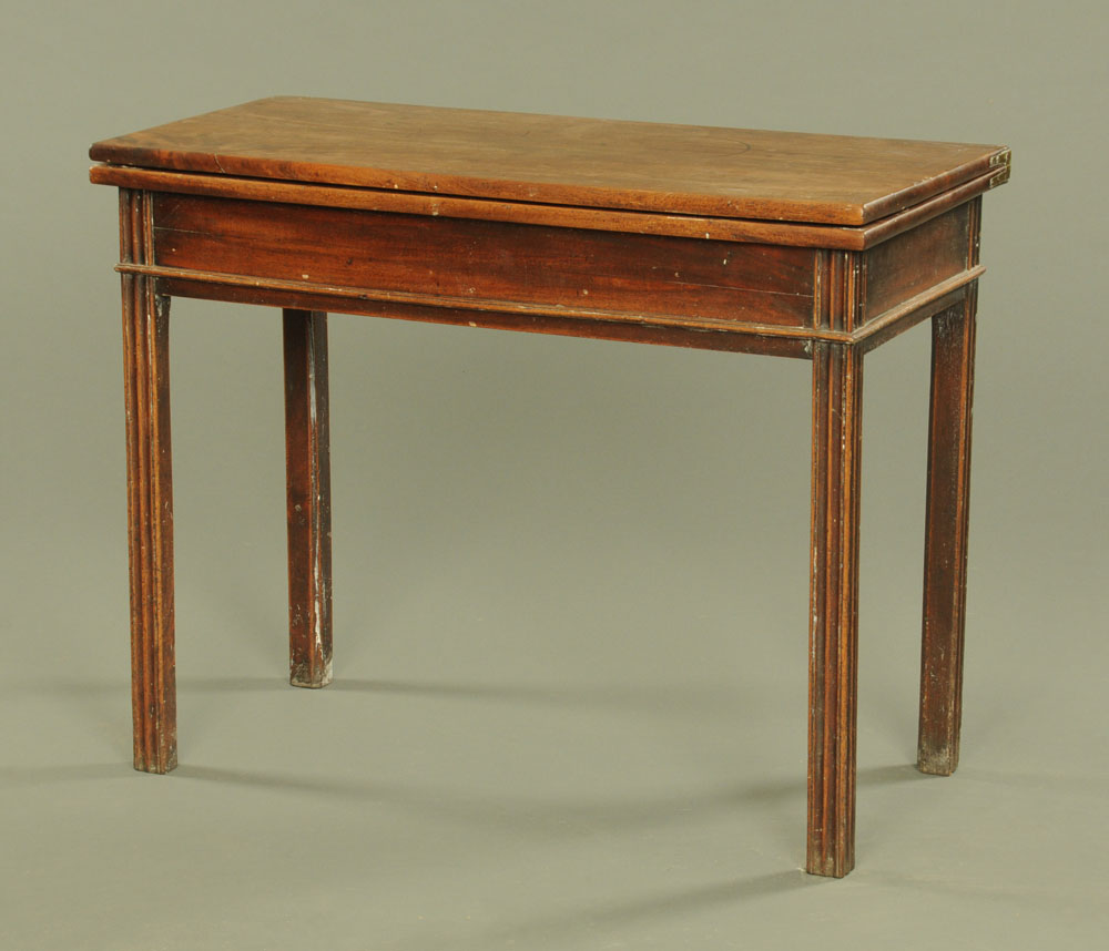 A George III mahogany rectangular tea table, on square moulded legs.