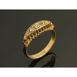 An 18 ct gold diamond set five stone ring, Size M, 3.29 grams.