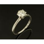 A platinum solitaire diamond ring, the brilliant cut diamond claw set, stamped L42AWC & S Plat.