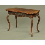 A late 19th century Anglo Indian serpentine turnover top games table,