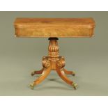 A George IV figured mahogany tea table,