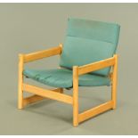 A vintage armchair, circa 1970. Height to top of back 74 cm, width across arms 63 cm.