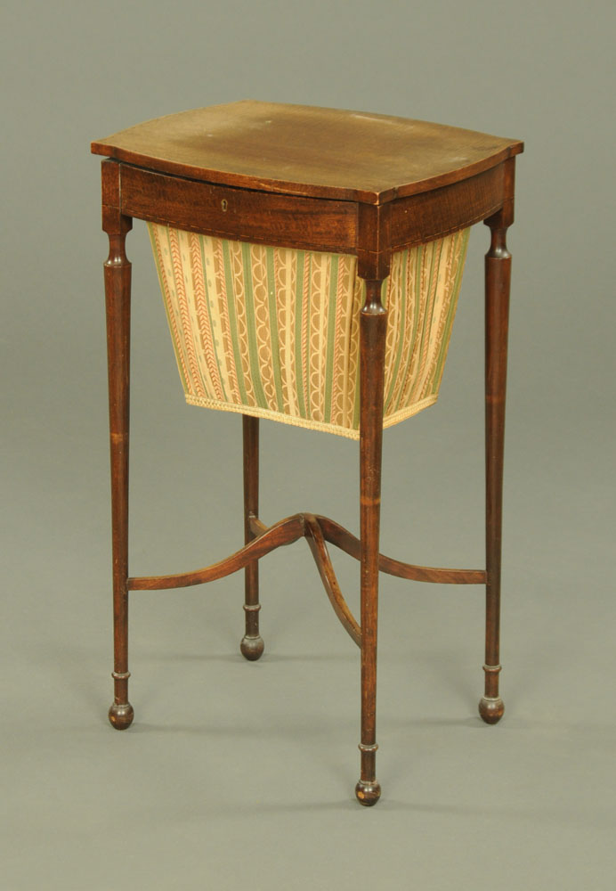 An Edwardian inlaid mahogany sewing table,