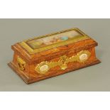 A Victorian figured walnut and gilt metal mounted two handled rectangular glove box by C Betjeman &