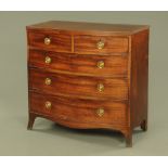 An early 19th century mahogany bow fronted chest of drawers,