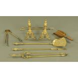 A brass three piece companion set of Victorian design,